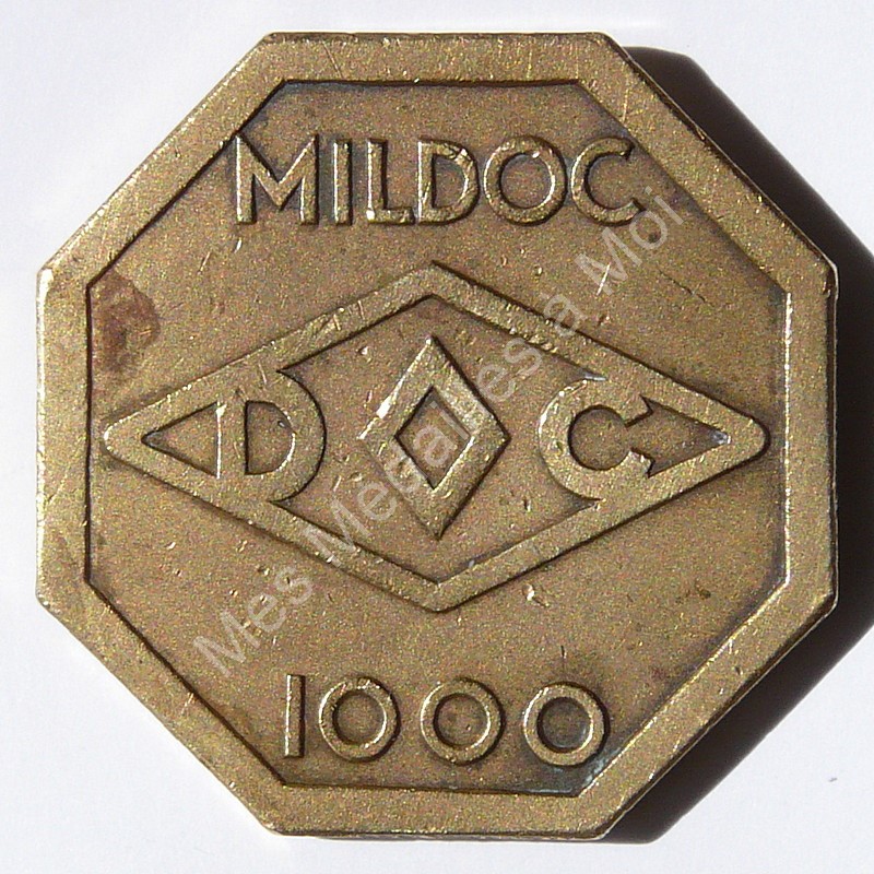 Tête de femme à droite coiffée de lierre - Mildoc Tête de femme à droite coiffée de lierre - Mildoc